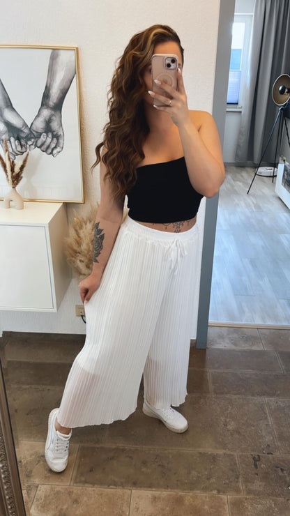 Pantalones plisados blancos
