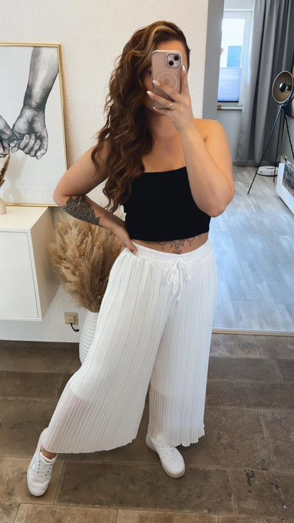 Pantalones plisados blancos