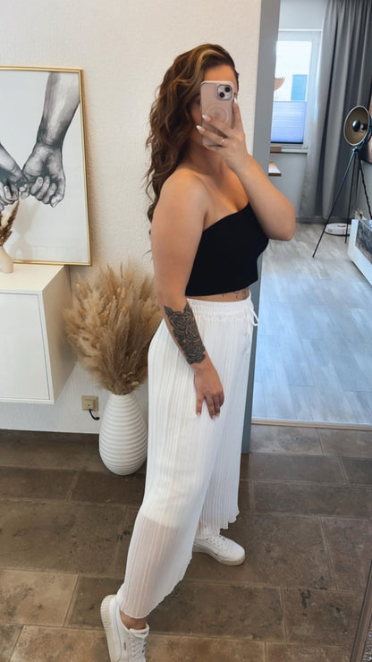 Pantalones plisados blancos