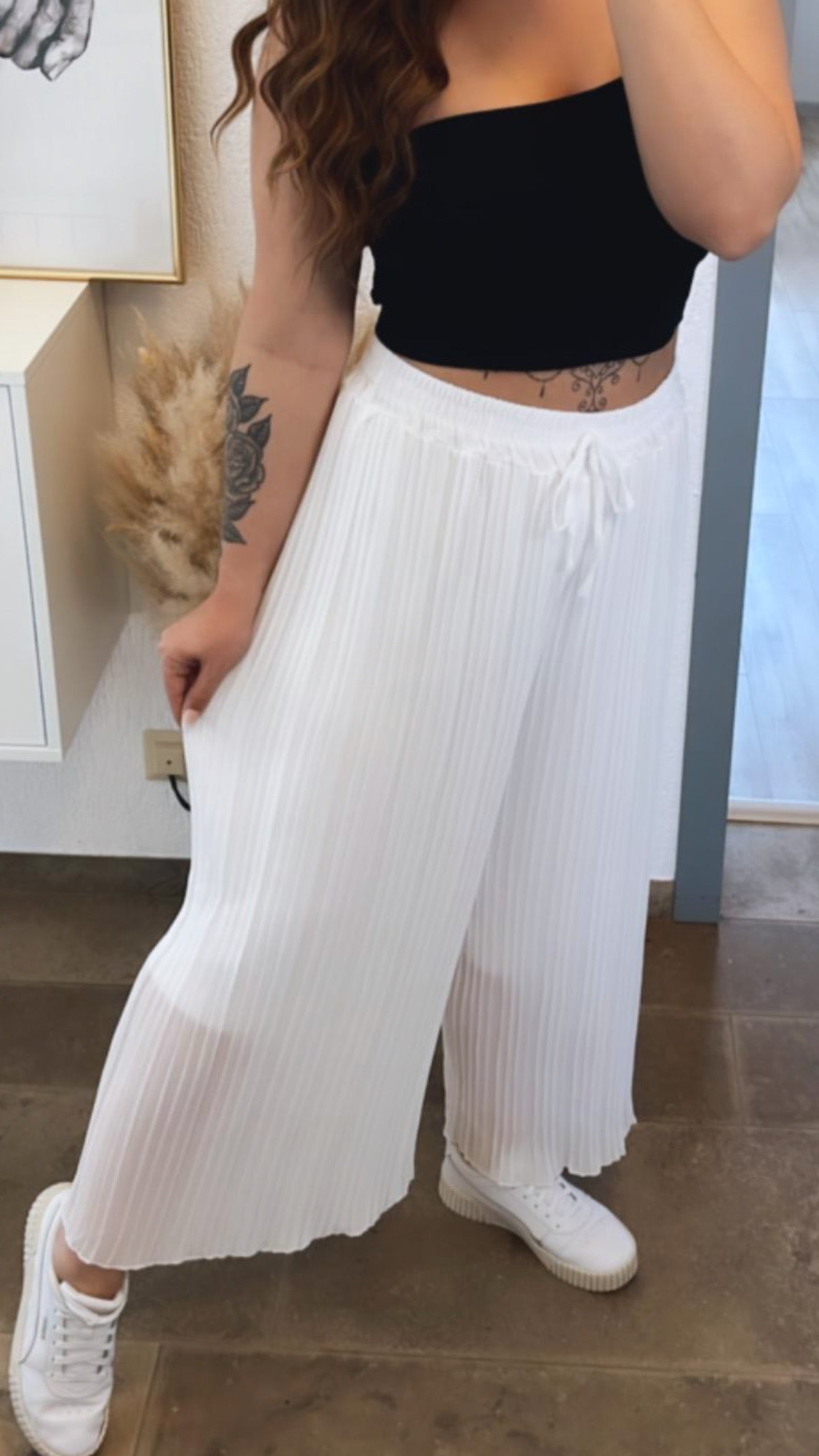 Pantalones plisados blancos
