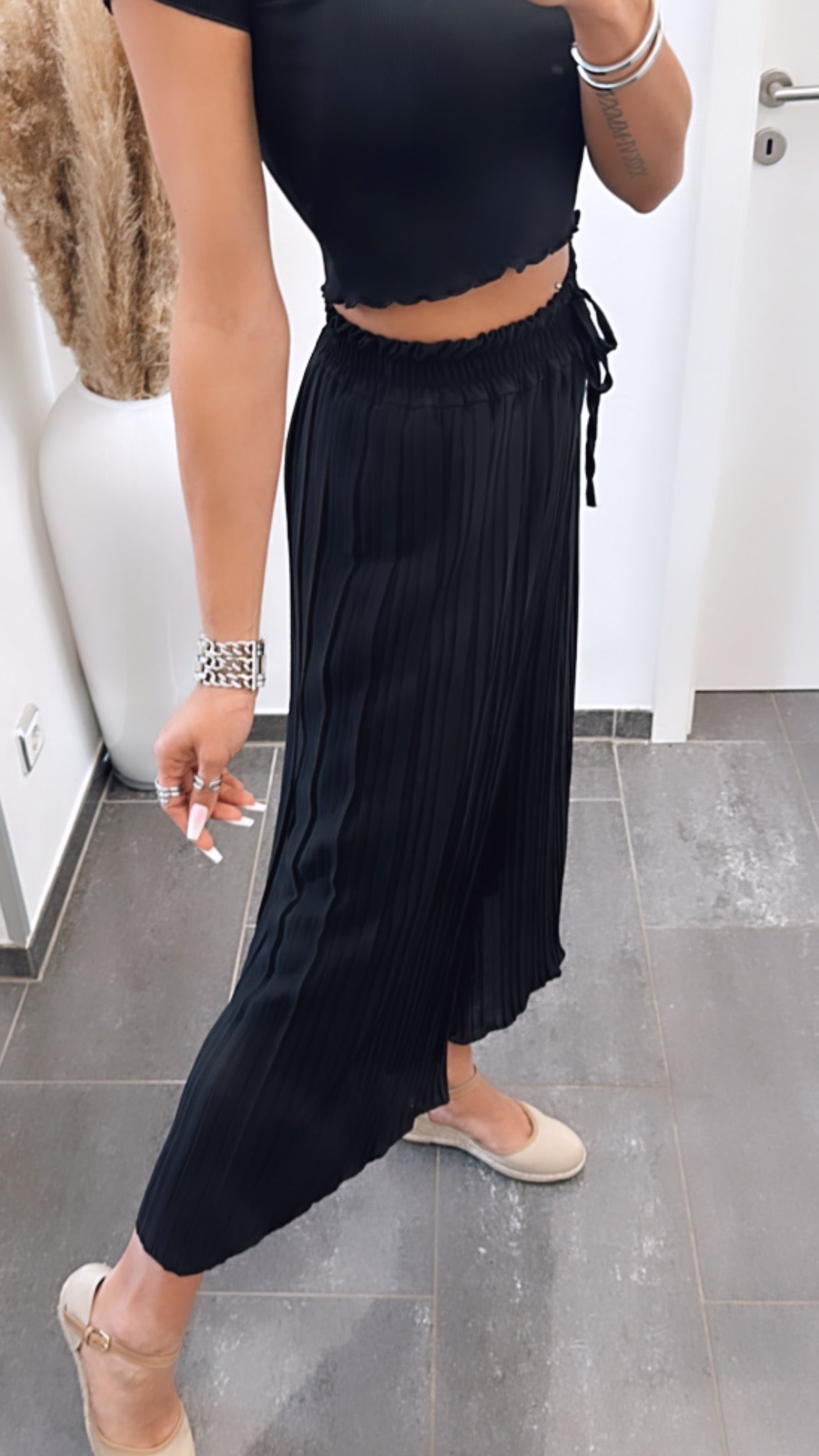 Pantalones plisados negros