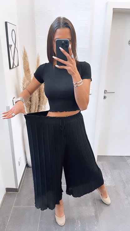 Pantalones plisados negros