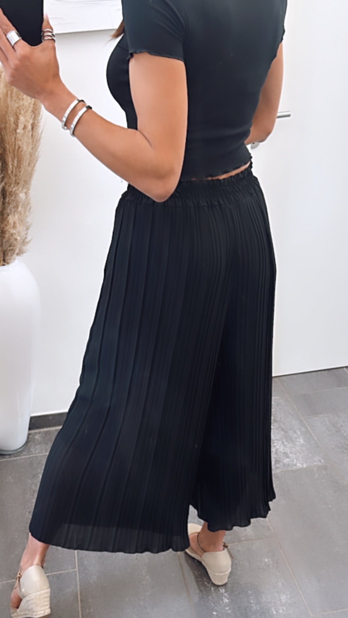Pantalones plisados negros