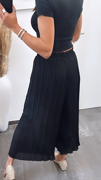 Pantalones plisados negros