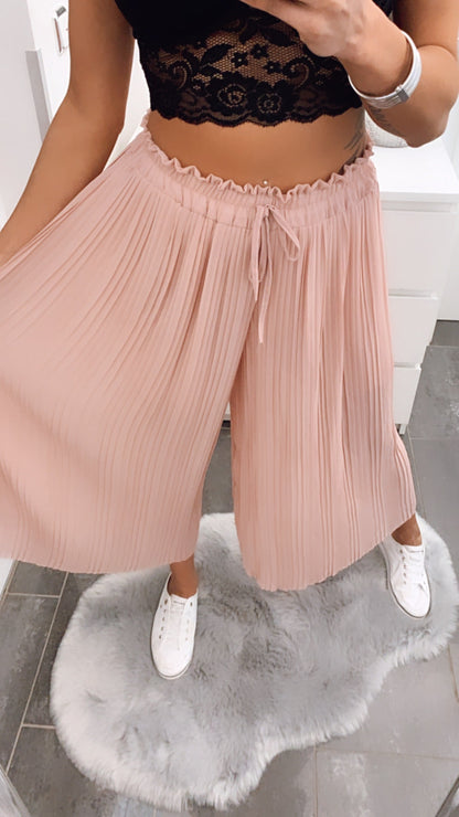 Pantalones plisados rosa