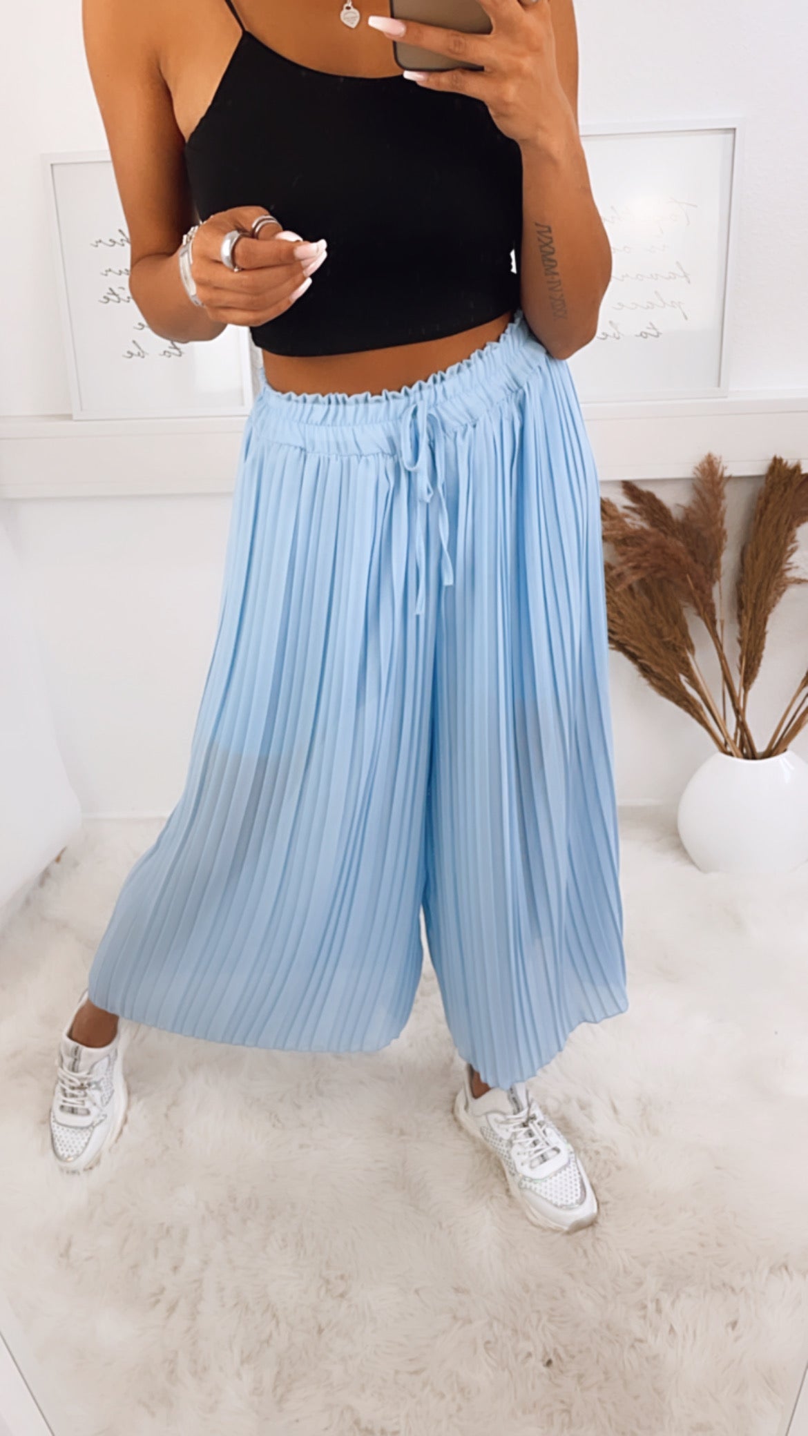 Pantalones plisados / azul claro