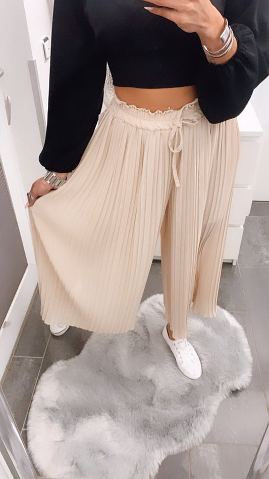 Pantalones plisados beige